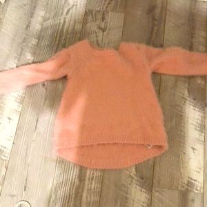 Pink sweater or shirt